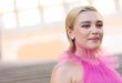 Florence Pugh stuns in a see-through pink Valentino gown that reveals her bare chest